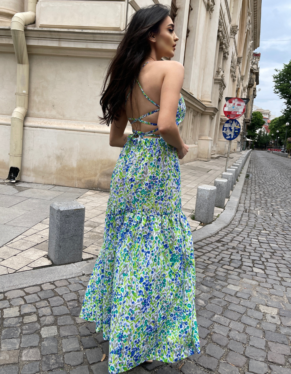 girl wearing an open back dress pattern