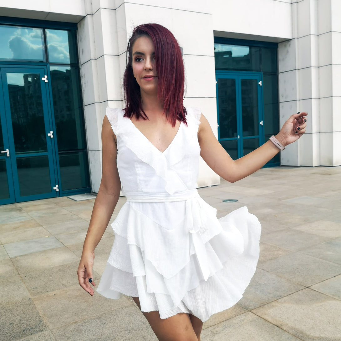 redhead woman wearing a white flouncy diy sewn white dress pattern