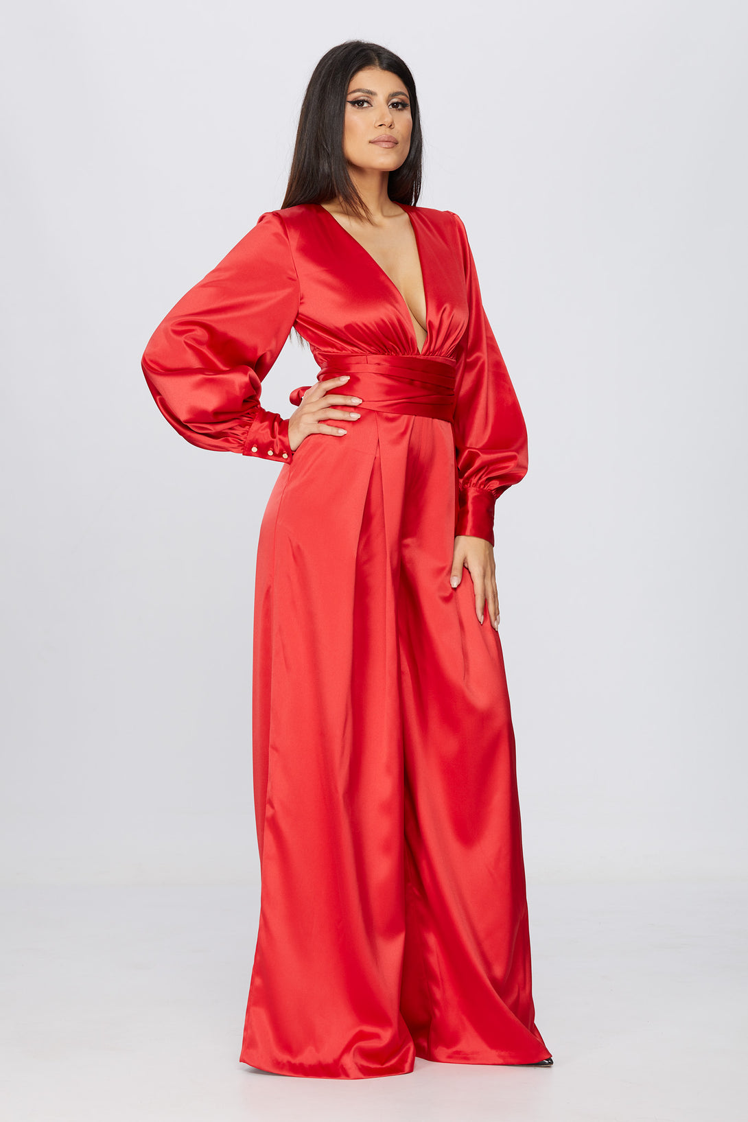 studio photoshoot of a woman wearing a wide leg jumpsuit pattern