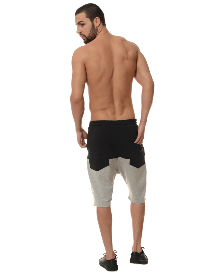 back of a man posing for a pair of shorts