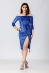 woman wearing a blue bodycon off the shoulder dress pattern